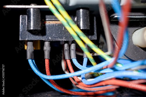 Wires close-up in a household home appliance coffee maker. the concept of home appliances repair