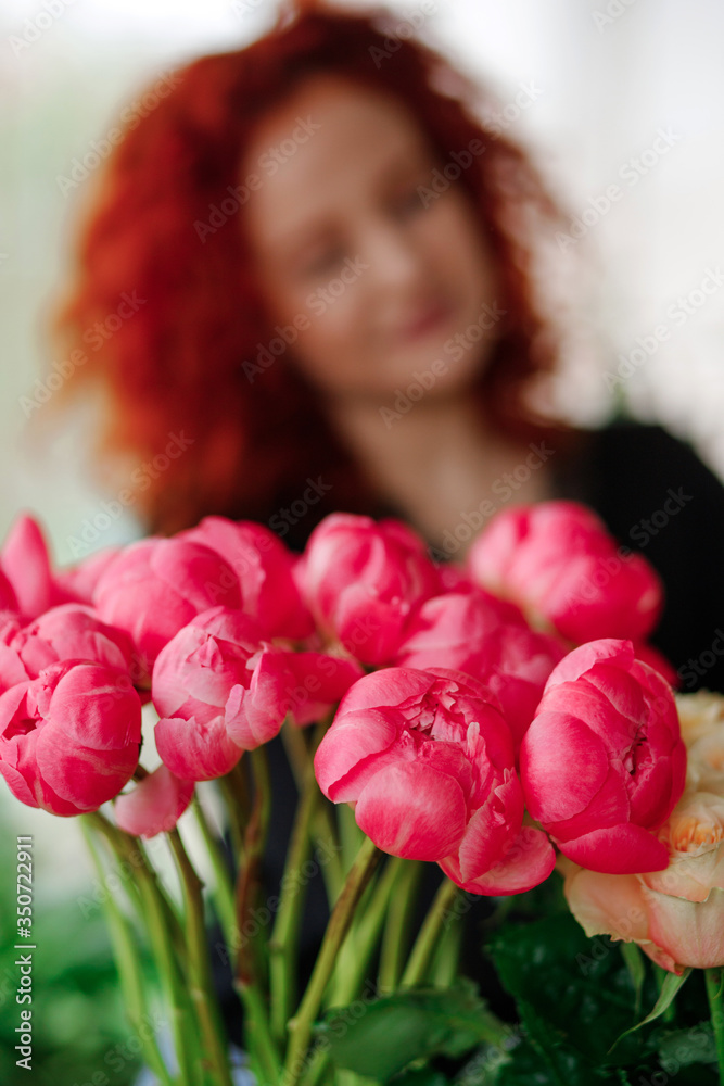 Pink peonies on a florist background