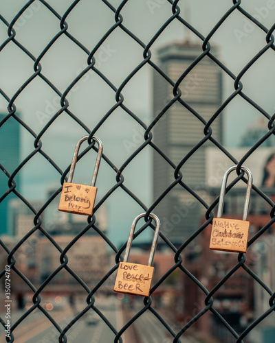 pictures of locks with the boston skyline