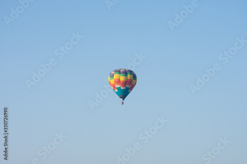  balloon flying in the blue sky
