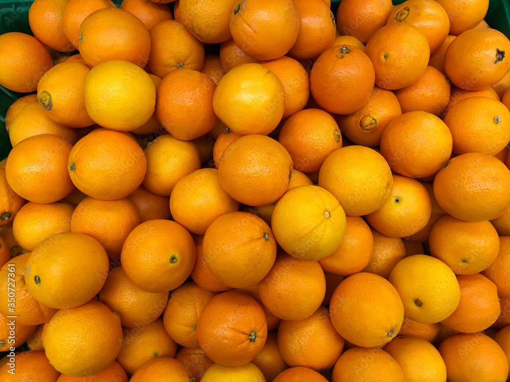 Close-up oranges fruits in a supermarket, food and retail concept Close-up oranges fruits in a supermarket, food and retail concept