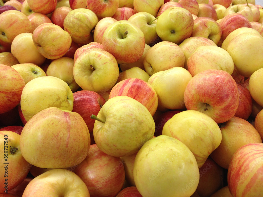 Close-up red-yellow apples in a supermarket, food and retail concept Close-up red-yellow apples in a supermarket, food and retail concept