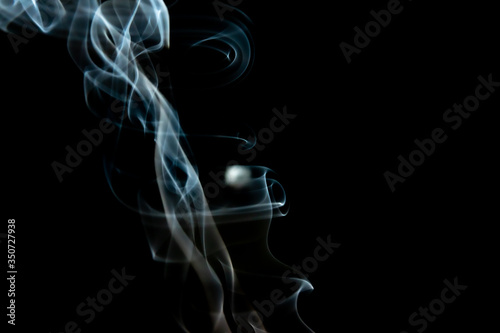 Movement of abstract smoke isolated on black background and texture path.