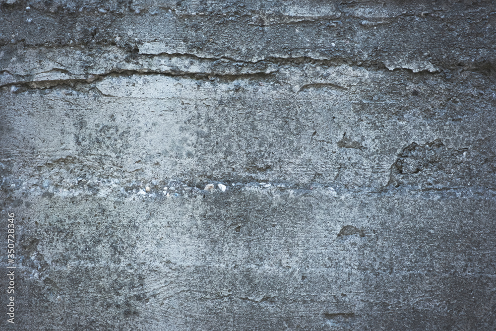 Grungy and smooth bare concrete wall. Grungy and smooth bare concrete wall.