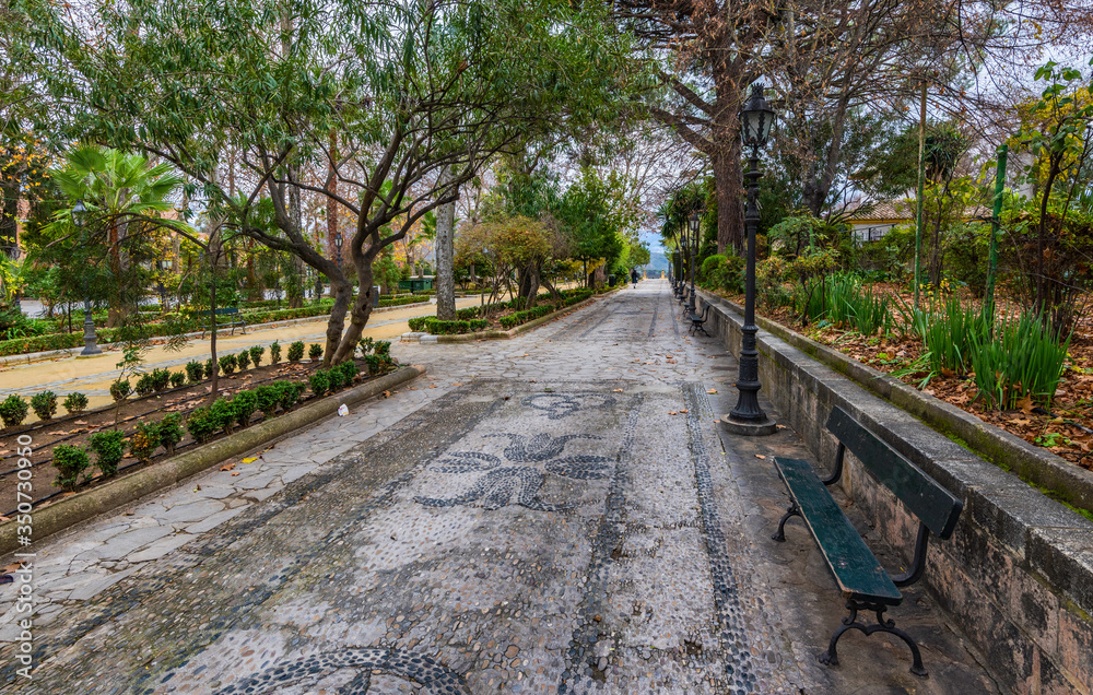 A garden path leading to a view point in Ronda Spain A garden path leading to a view point in Ronda Spain