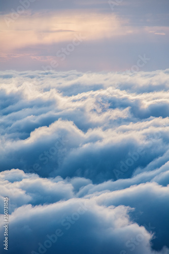 View of the clouds from above at dawn