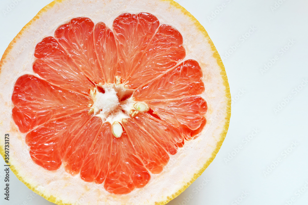 Fresh cut grapefruit fruit on white background Fresh cut grapefruit fruit on white background