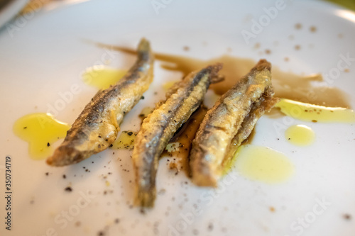 Fried anchovys served with Balsamic vinegar and Olive oil in Genova, Italy