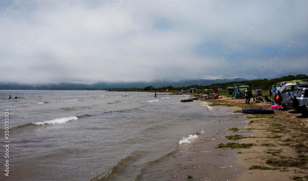 summer thunderclouds over the beach summer thunderclouds over the beach