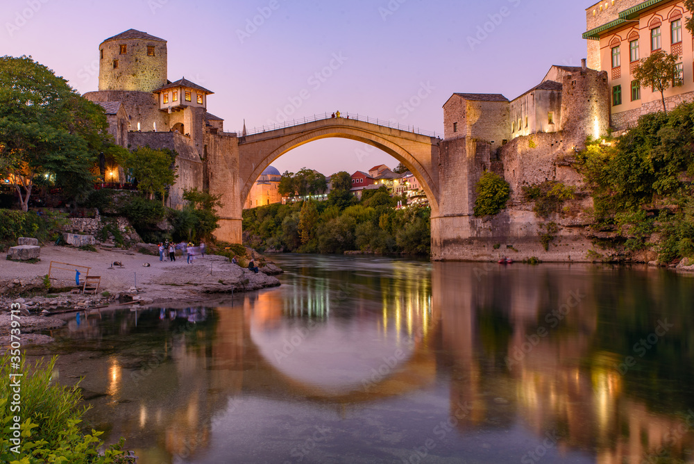 Mostar Bridge at sunset time, an Ottoman bridge in Mostar, Bosnia and Herzegovina