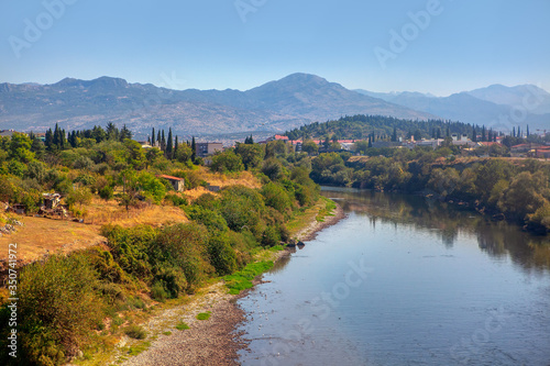 Fototapeta Naklejka Na Ścianę i Meble -  Scenery of Moraca river in Podgorica from Montenegro