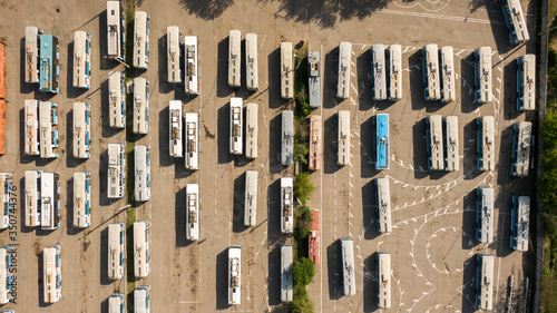Canvas Print Many trolleybuses parked in front of the trolley depot hangar