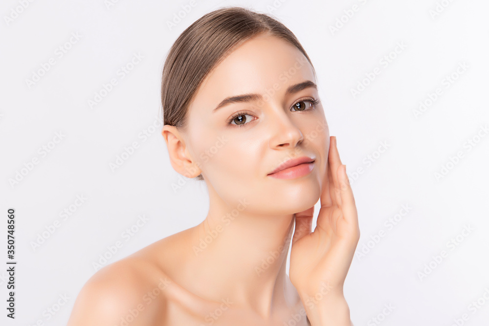 Beautiful Young Woman touching her clean face with fresh Healthy Skin, isolated on white background, Beauty Cosmetics and Facial treatment Concept Beautiful Young Woman touching her clean face with fresh Healthy Skin, isolated on white background, Beauty Cosmetics and Facial treatment Concept