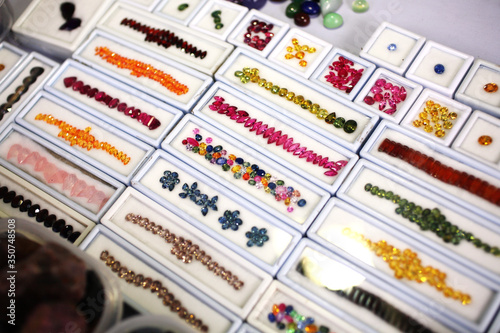 Wallpaper Mural Artificial gems on plastic box in jewelry store Torontodigital.ca