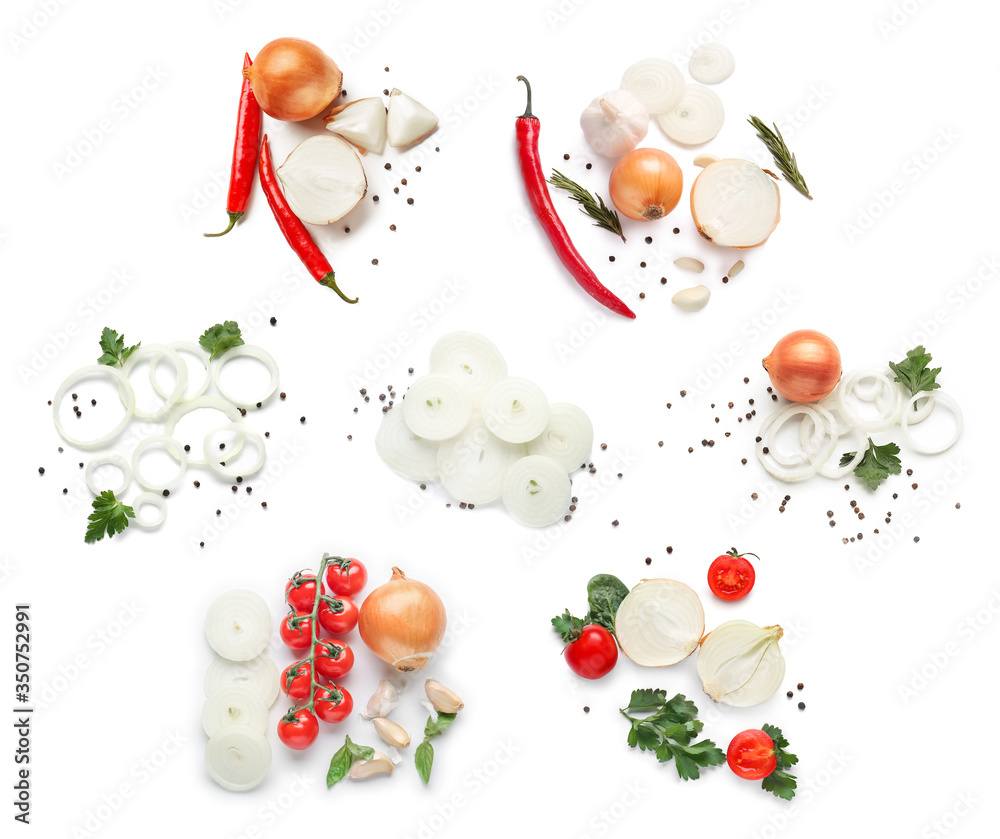 Composition with raw cut onion, spices and vegetables on white background