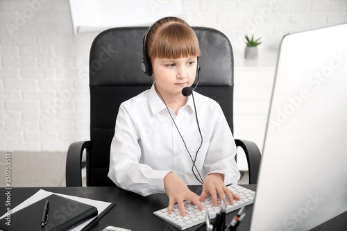 Little secretary working in...