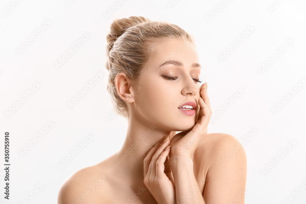 Portrait of beautiful young woman on white background Portrait of beautiful young woman on white background
