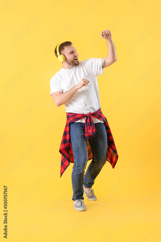 Handsome dancing man on color background Handsome dancing man on color background