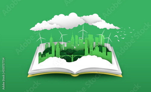 Open book of 3d papercut green city concept