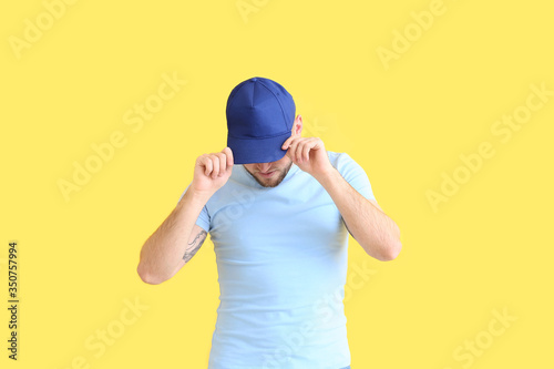 Handsome man in stylish cap...