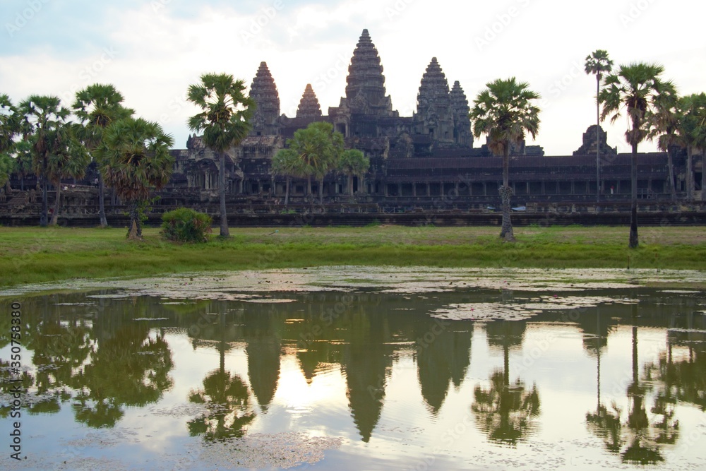 Angkor wat at sunrise with reflection and sky at siem reap cambodia Angkor wat at sunrise with reflection and sky at siem reap cambodia