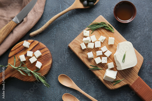 Papier peint Composition with tasty cut feta cheese on table