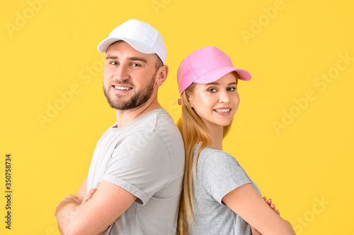 Young couple in stylish cap...