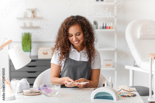 Portrait of manicure master...