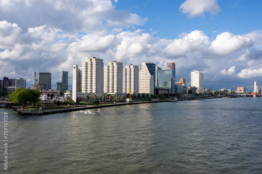 Rotterdam skyline in the Netherlands with the river in the summer