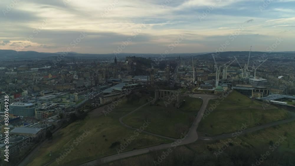 Aerial view on overcast day from Calton Hill overlooking Edinburgh monuments with Castle in distance Aerial view on overcast day from Calton Hill overlooking Edinburgh monuments with Castle in distance