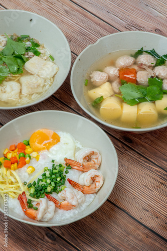 Top view composition with Thai Food. Congee shrimp, Thai Rice Soup and Clear Soup with Tofu and Minced Pork