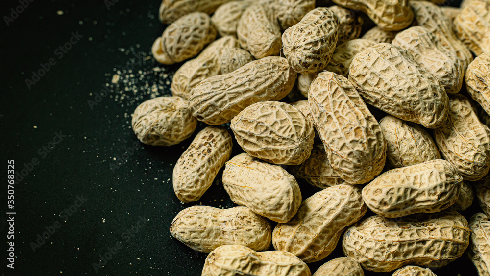 peanuts in a shell texture for food content. peanuts in a shell texture for food content.