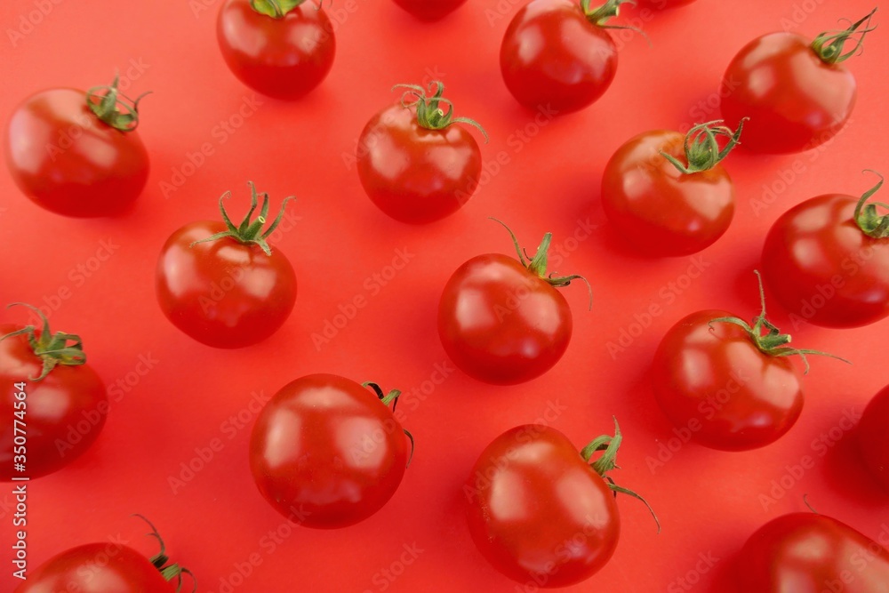 Tomato pattern. Tomato background. Red ripe tomatoes on a bright red background. Tomatoes season vegetables. organic bio vegetables Tomato pattern. Tomato background. Red ripe tomatoes on a bright red background. Tomatoes season vegetables. organic bio vegetables