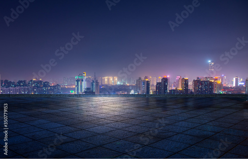 Fototapeta Naklejka Na Ścianę i Meble -  Night view of city lights in front of marble square, Xuzhou, China