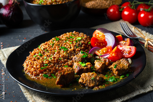 Buckwheat groats baked in the oven with beef goulash