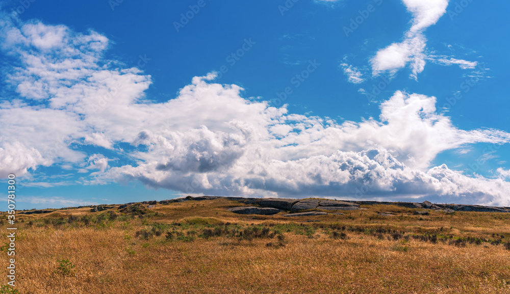 Clouds over the savannah, wide panorama