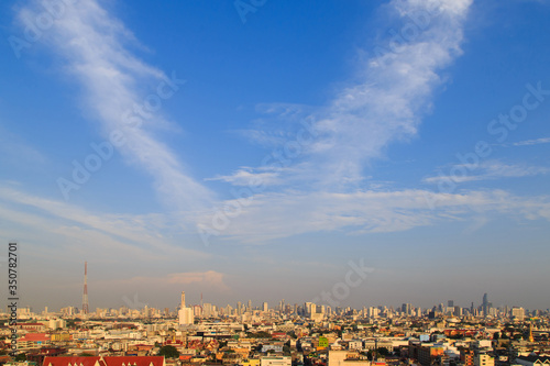 Cityscape at evening time. Beautiful sky over the city