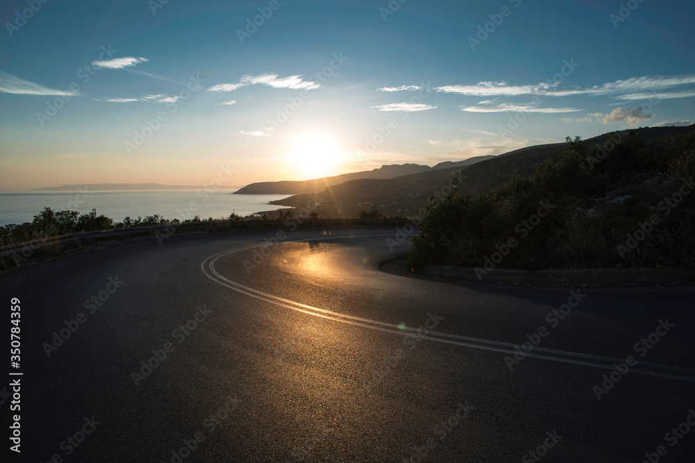 Mediterranean road on sunset