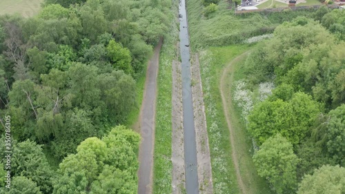 Aerial shot of small canal in a park photo