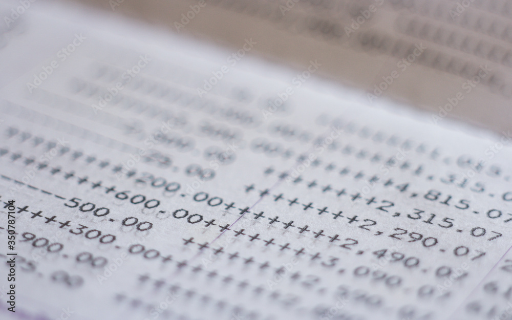 bank account. Close up financial report statement monthly book bank account passbook saving money bank account. Close up financial report statement monthly book bank account passbook saving money