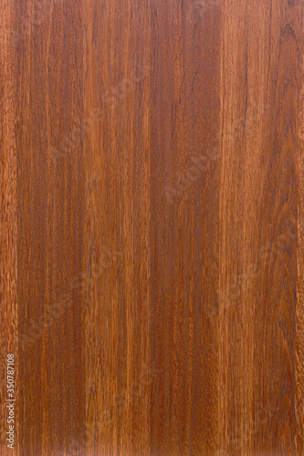 Closeup of abstract natural dark brown plywood background