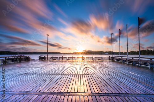 Fototapeta Naklejka Na Ścianę i Meble -  sunset on the city beach in Olsztyn Poland