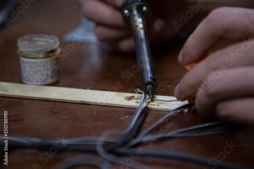 blowtorch, male hands, equipment repair at home