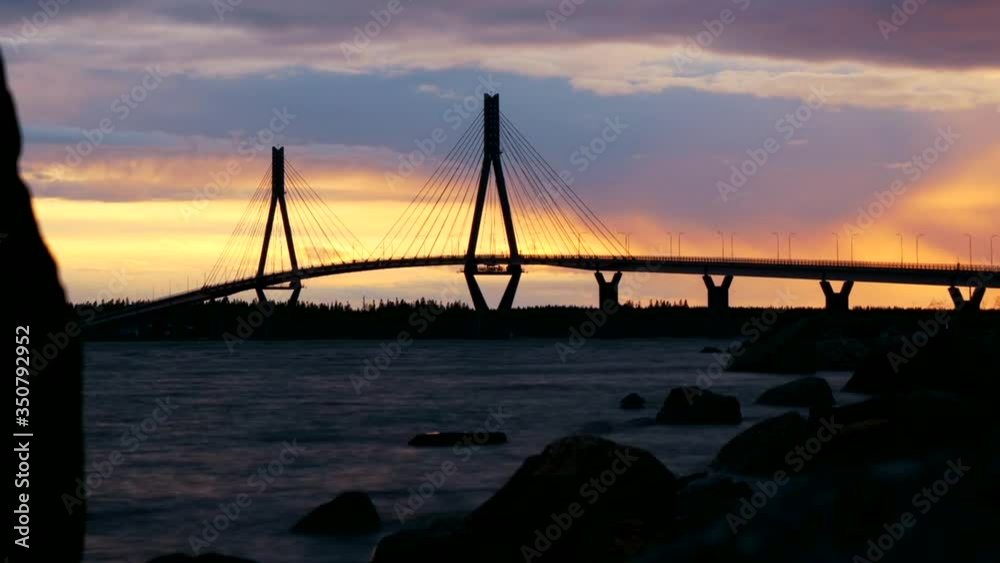 Time Lapse Pastel Colored Sunset Clouds Over The Longest bridge in Finland