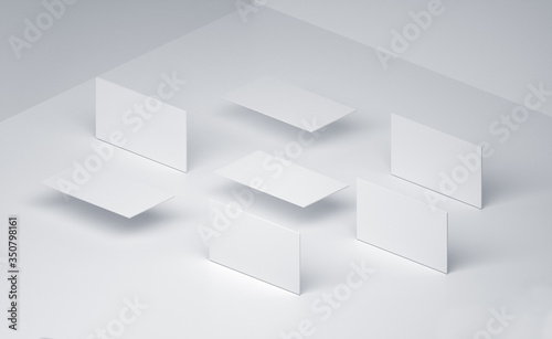 3d-render mockup of business cards at white textured paper background.