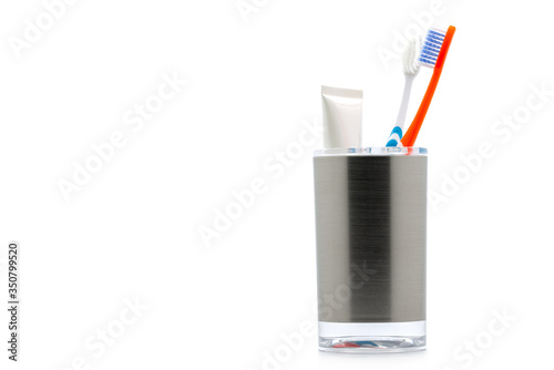 Wallpaper Mural Toothbrushes in glass or cup on white background. Torontodigital.ca