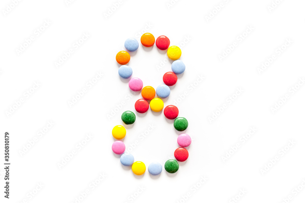 Number 8 - eight - lined with sweets on isolated top-down Number 8 - eight - lined with sweets on isolated top-down