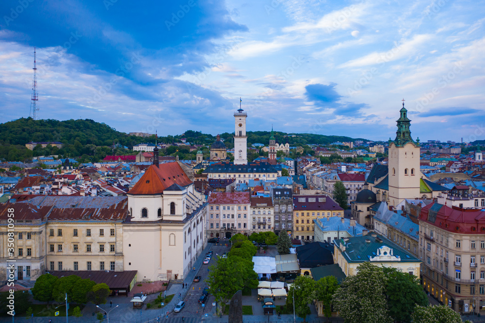 Fototapeta premium Aerial view on Jesuit Church, City Hall and Latin Cathedral in Lviv, Ukraine from drone