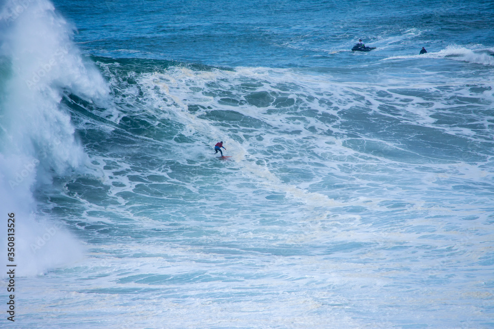Nazare has one thing which attracts thousands of tourists and just few surfers who are brave and crazy enough to ride the biggest waves on our planet. Nazare has one thing which attracts thousands of tourists and just few surfers who are brave and crazy enough to ride the biggest waves on our planet.