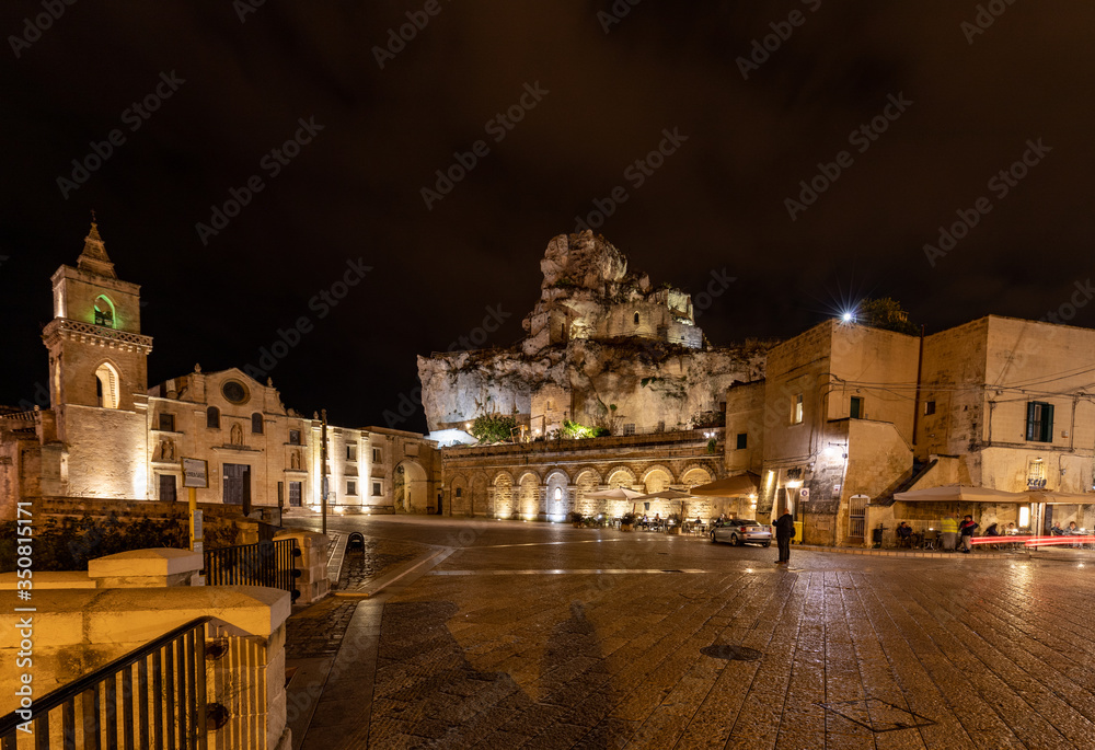  Night view at Church of San Pietro caveoso and on the top of the hill of Church of Saint Mary of Idris in Matera, Basilicata, Italy